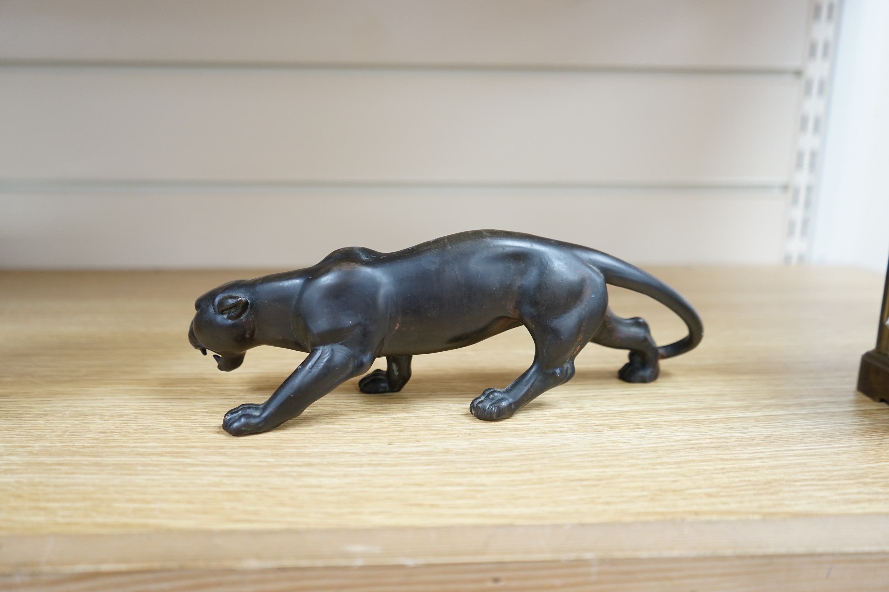 A small bronzed model of a Panther, 25cm long. Condition - some slight scuffing to surface